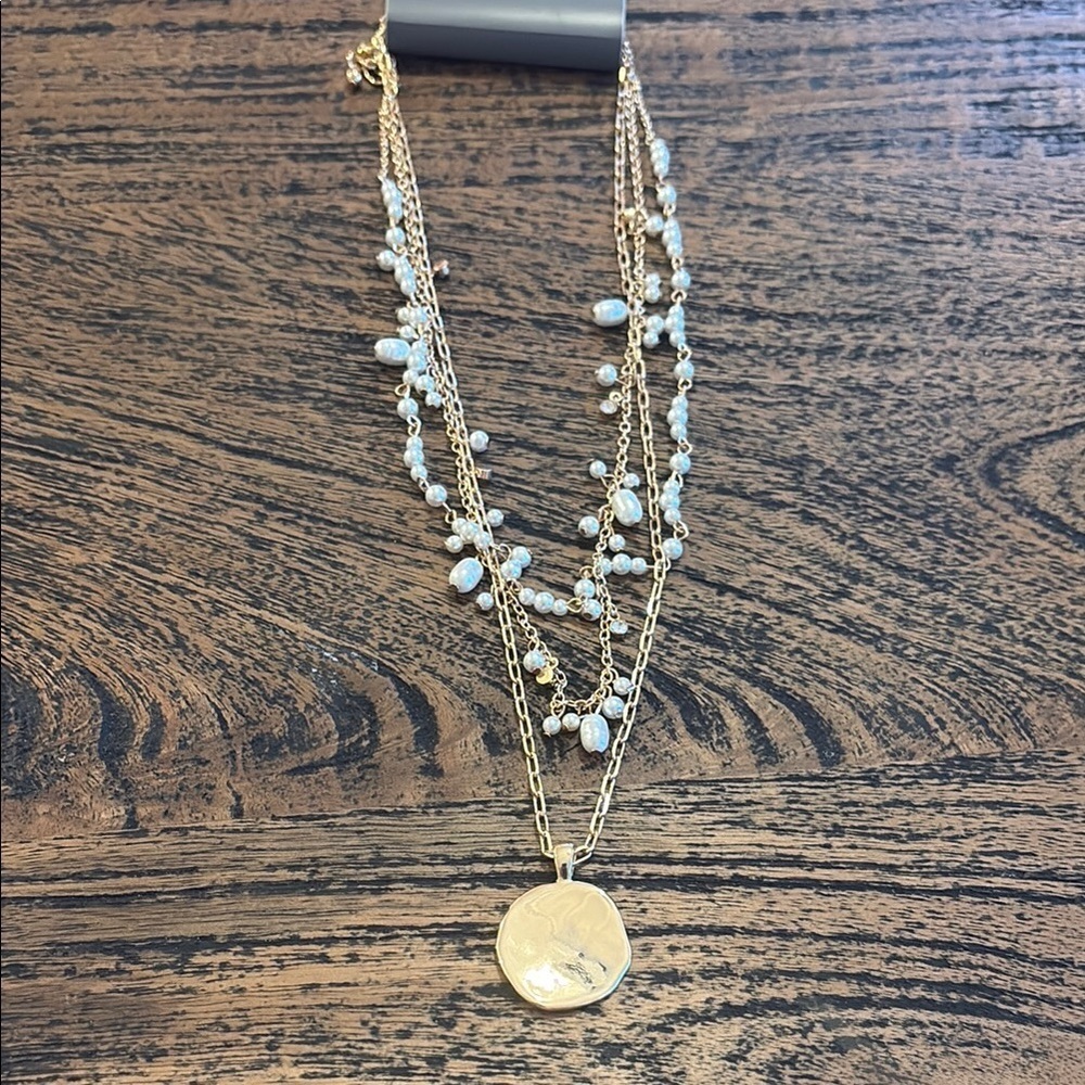Gold and White Layered Necklace with Circular Pendant